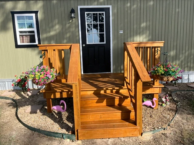 Porch steps and railing with a fresh stain