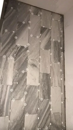 Tile floor going in on a recent job, spacers still in place